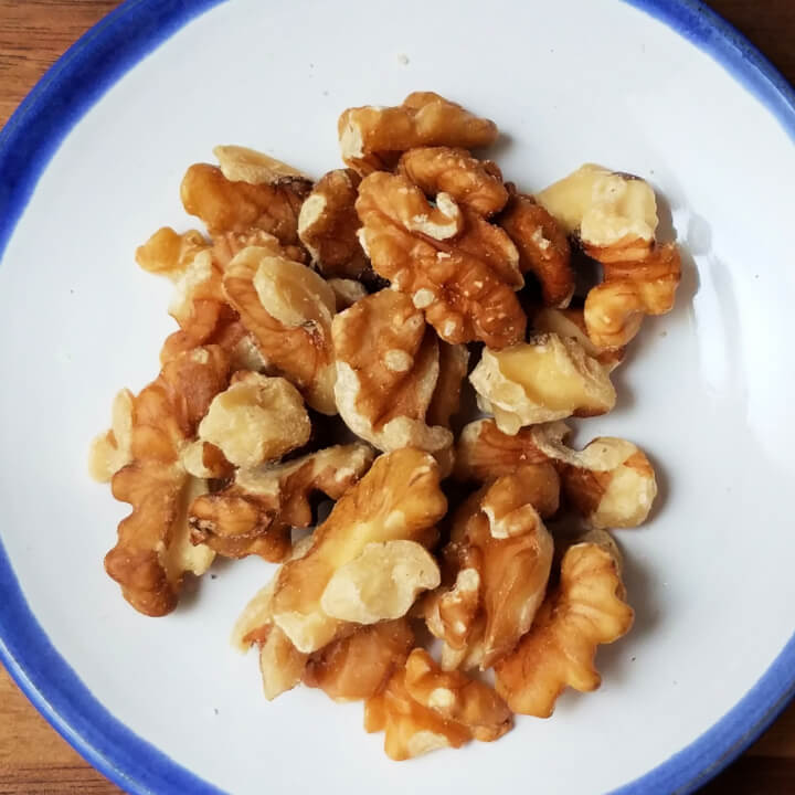 shelled walnuts on a plate